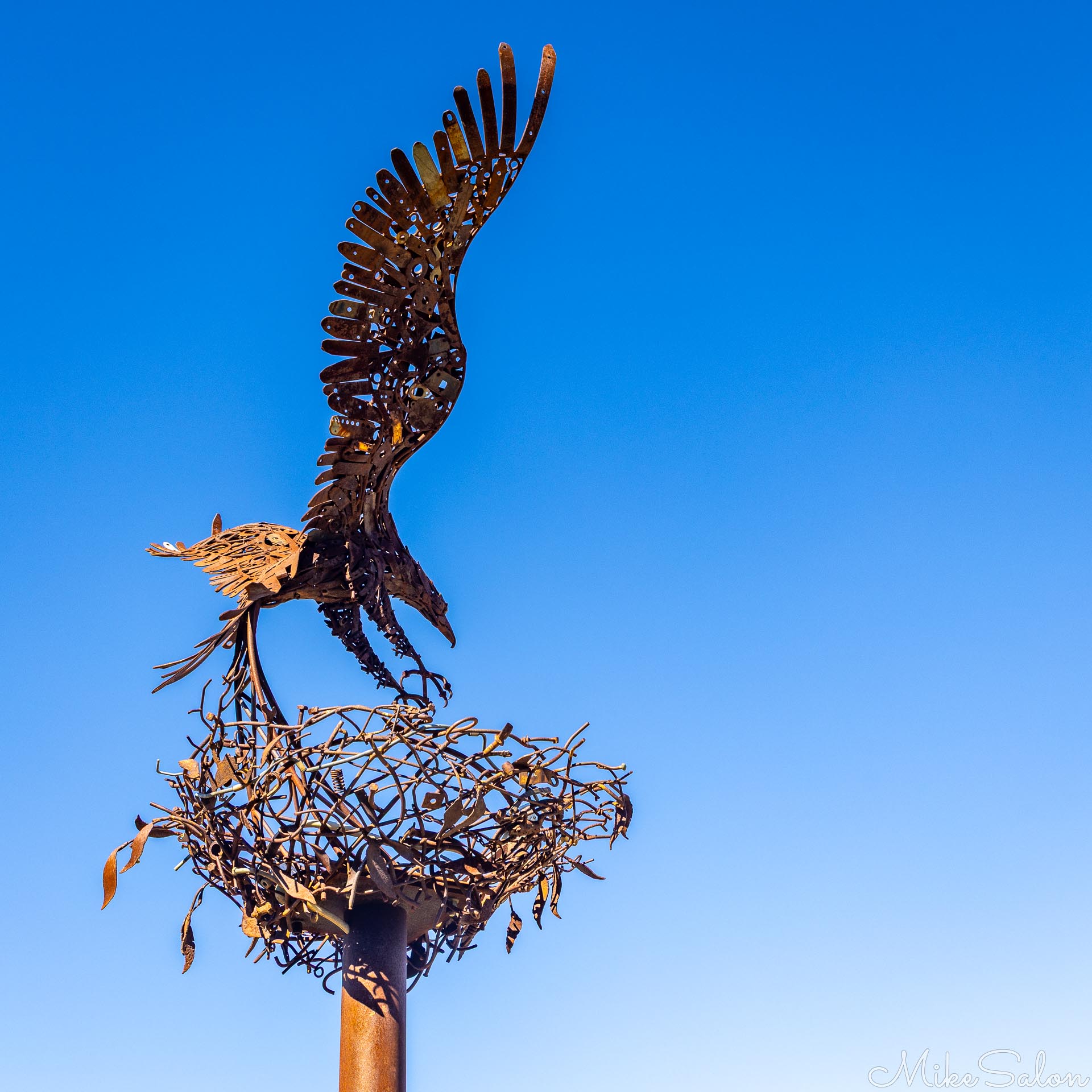 Impressive scrap metal statue of what we believe to be a wedge-tailed eagle at a nest, as seen at the Balranald Visitors` Centre. [4937]
