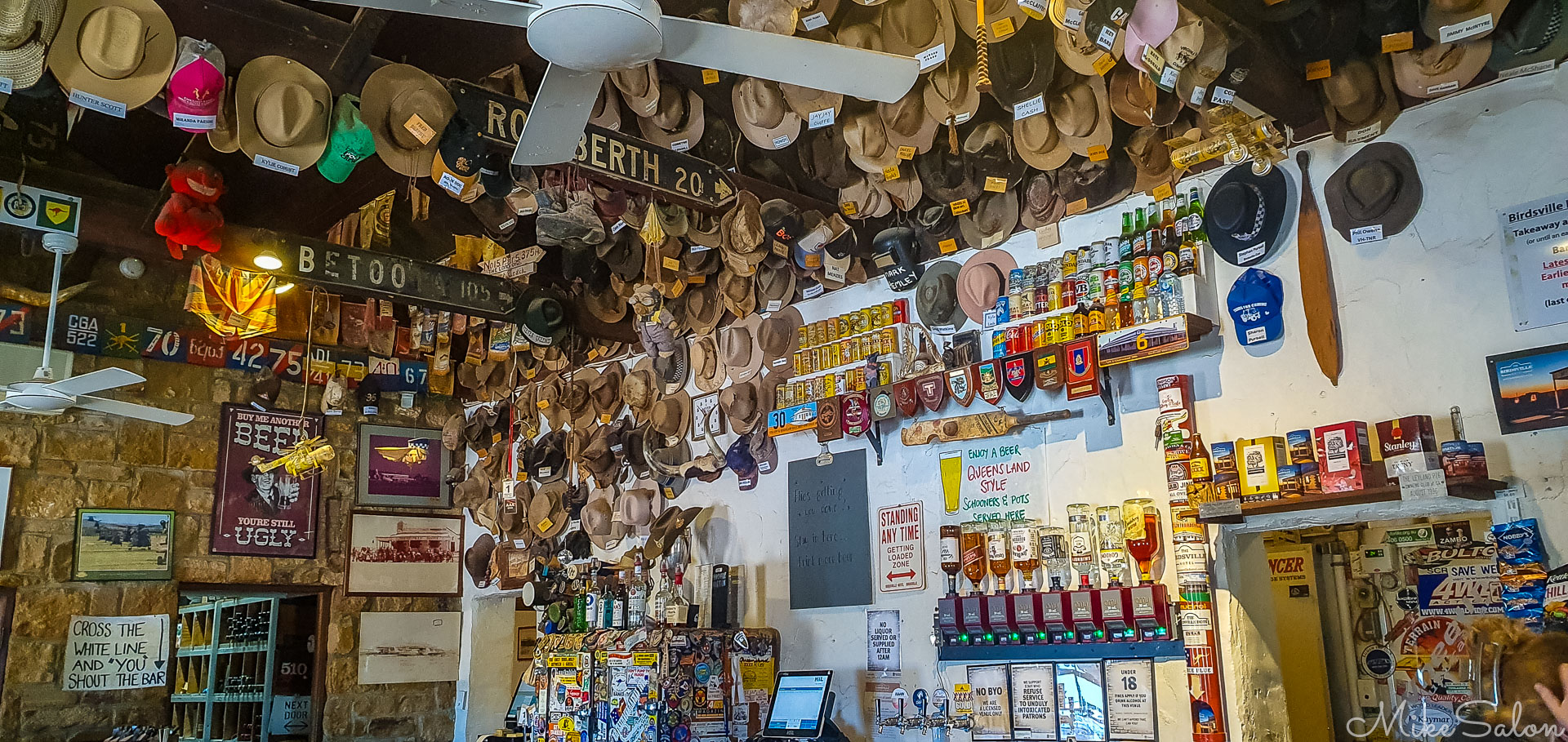 The main bar of the Birdsville Hotel, wall and ceiling crammed with memorabilia. [0635]