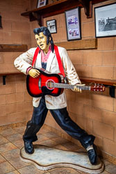 The King himself greets hungry travellers at the Bedourie bakery, guitar in hand and ready to rock while we wait for our freshly made sandwiches. A touch of outback kitsch that somehow feels right at home in the desert town. [1091]