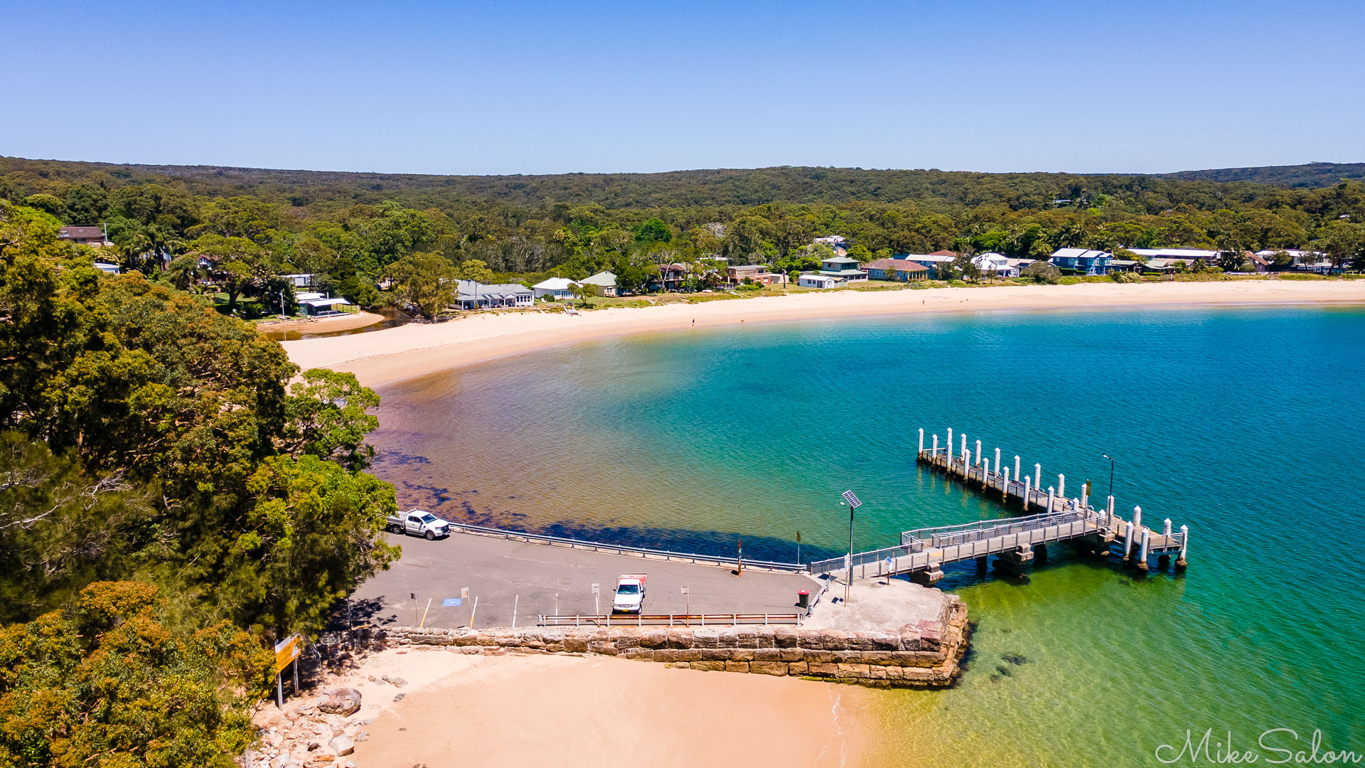 Almost deserted, the wharf at Bundeena between ferries, seen from the air. [0145]