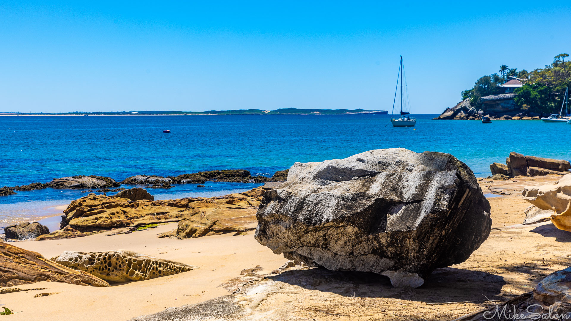 Looking from Bundeena across Port Hacking to the distant beaches of Kurnell. [6443]