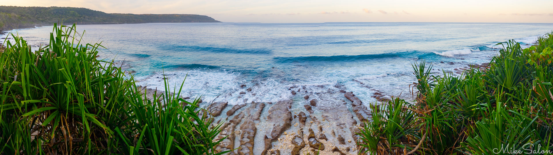 Beach view from Swell Lodge showing a rocky shore. [9727]