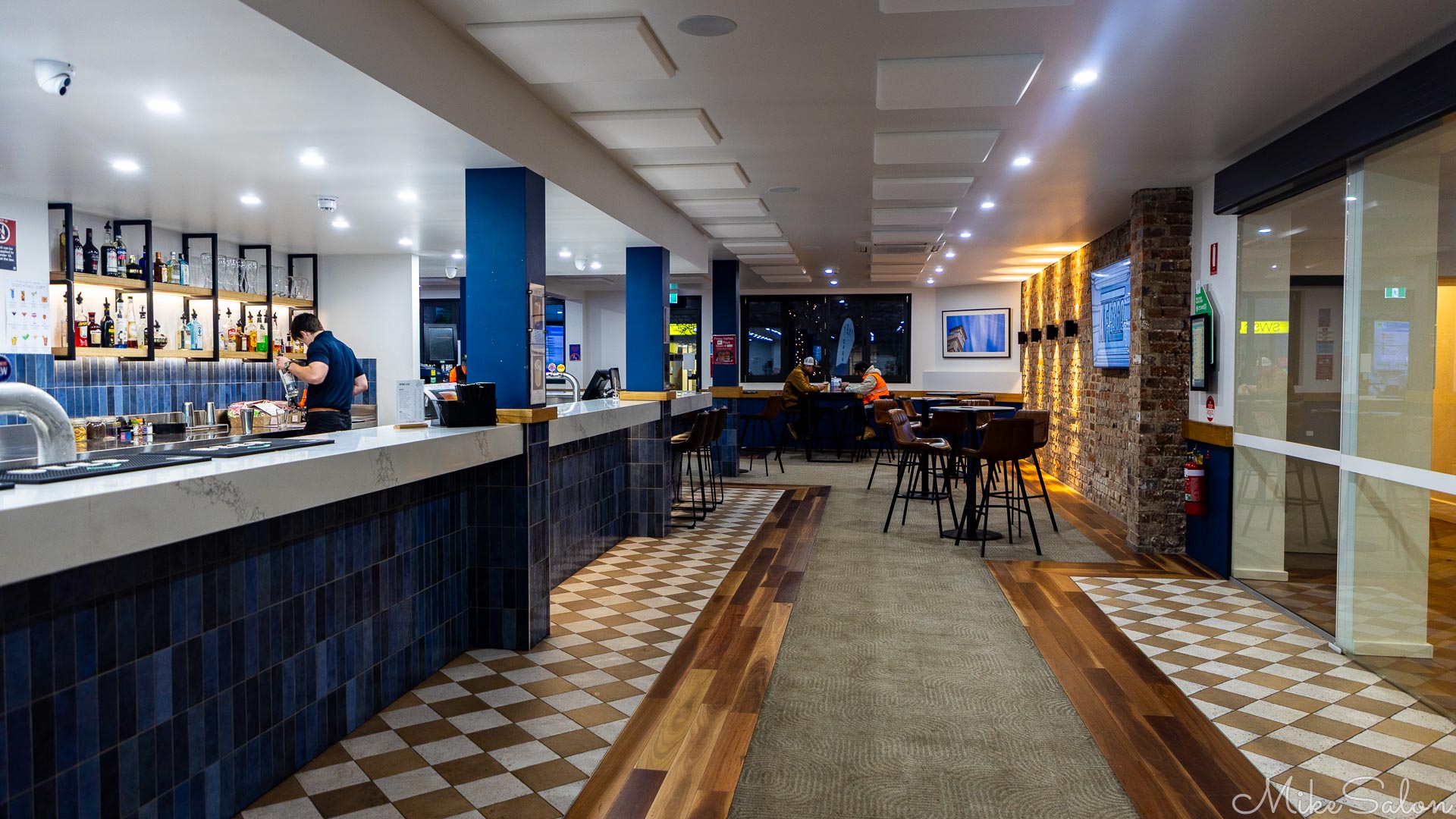 Interior view of Albion Hotel, Cootamundra, showing the bar renovations, with few customers. [5106]