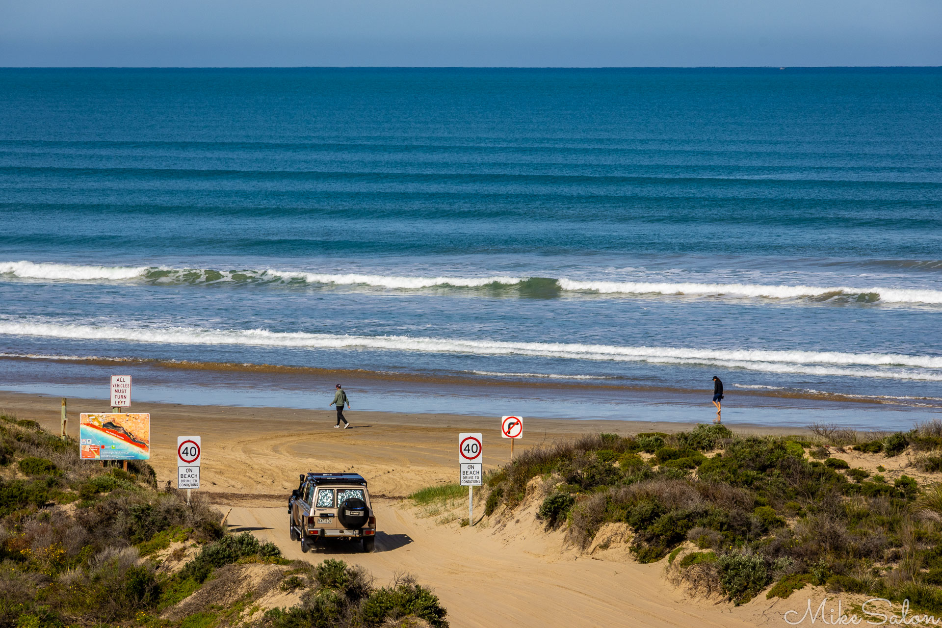 Car driving onto Goolwa Beach. [2025]