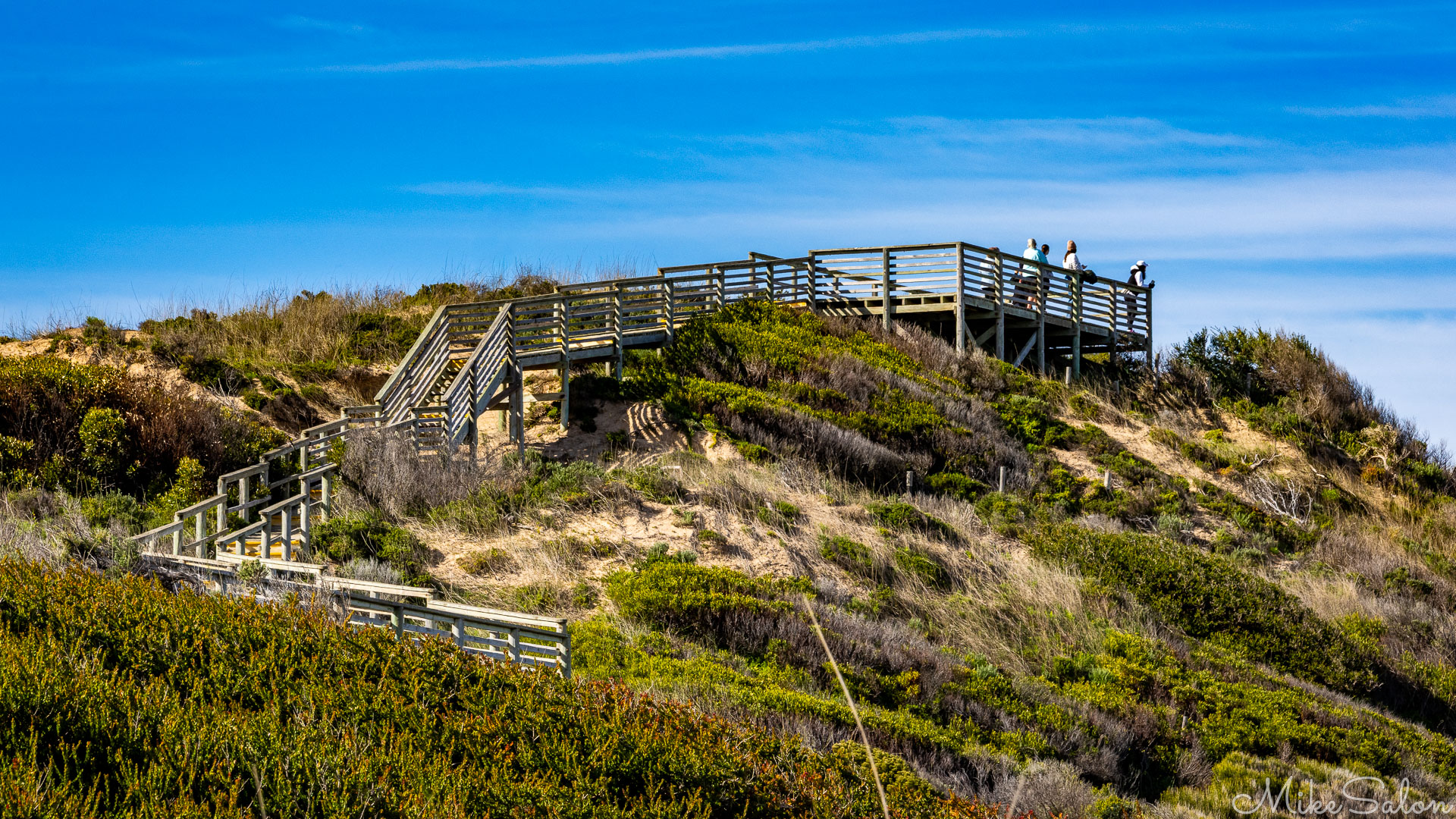 Timber boardwalk climbing up to Goola Beach whale-watching platform. [2023]