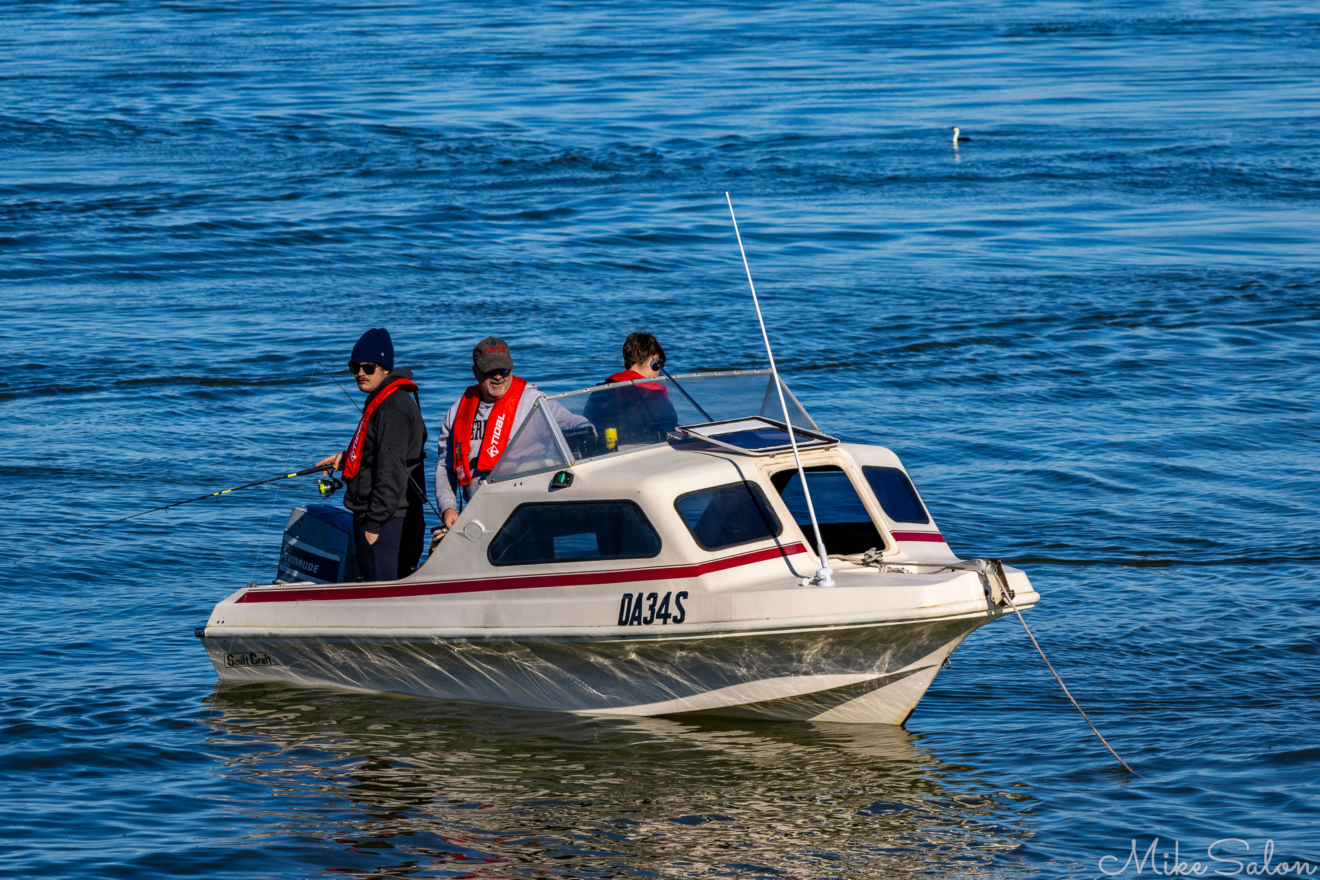 Runabout with three fishermen on board. [1629]