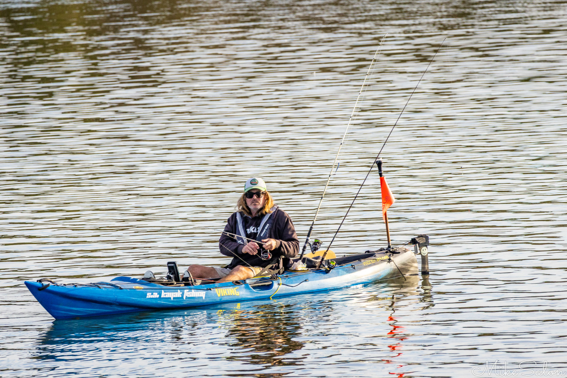 Kayaker and fisherman on the Coorong. [1954]