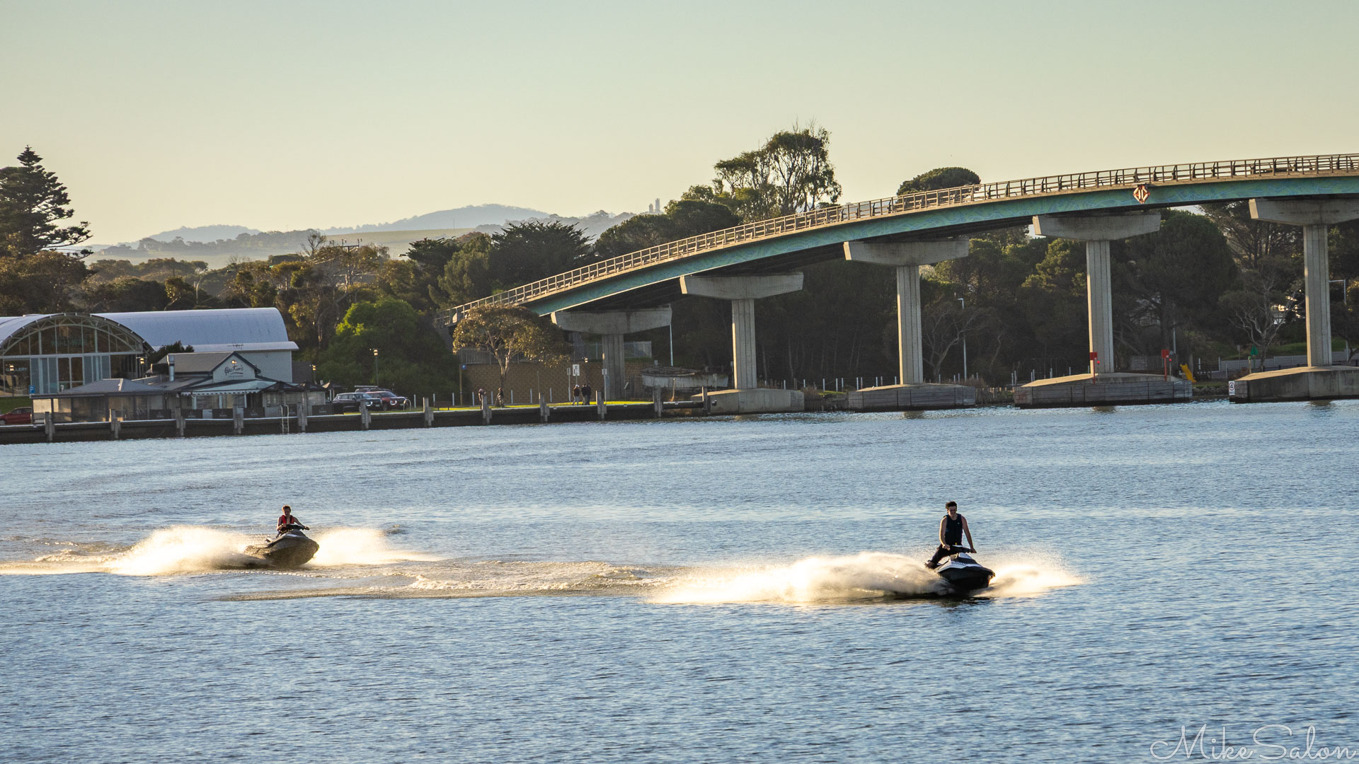 Two jet-skiers near the Hindmarsh Island Bridge. [1979]