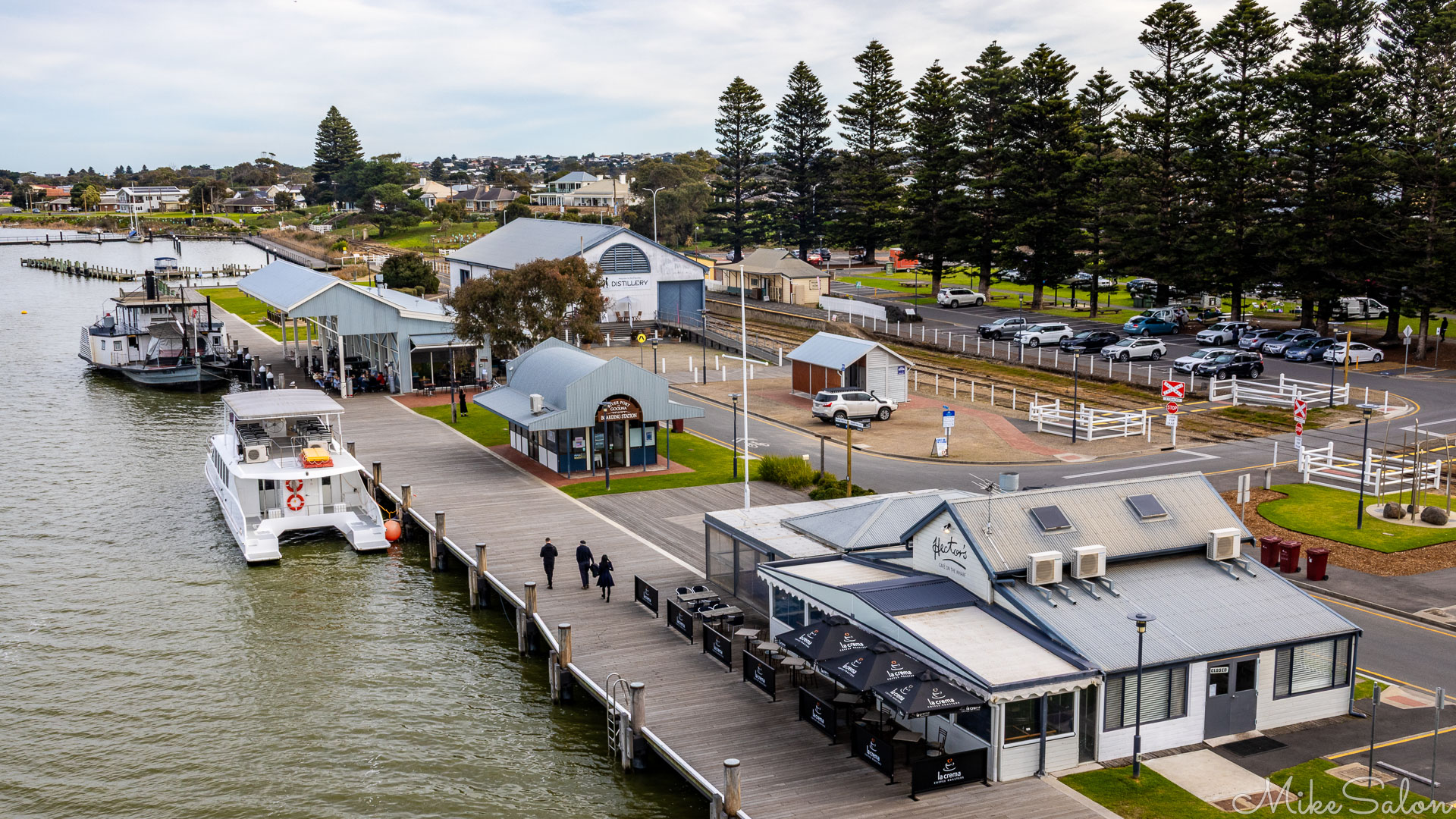 View of Goolwa Wharf precinct, showing cafes and cruise boats. [2155]