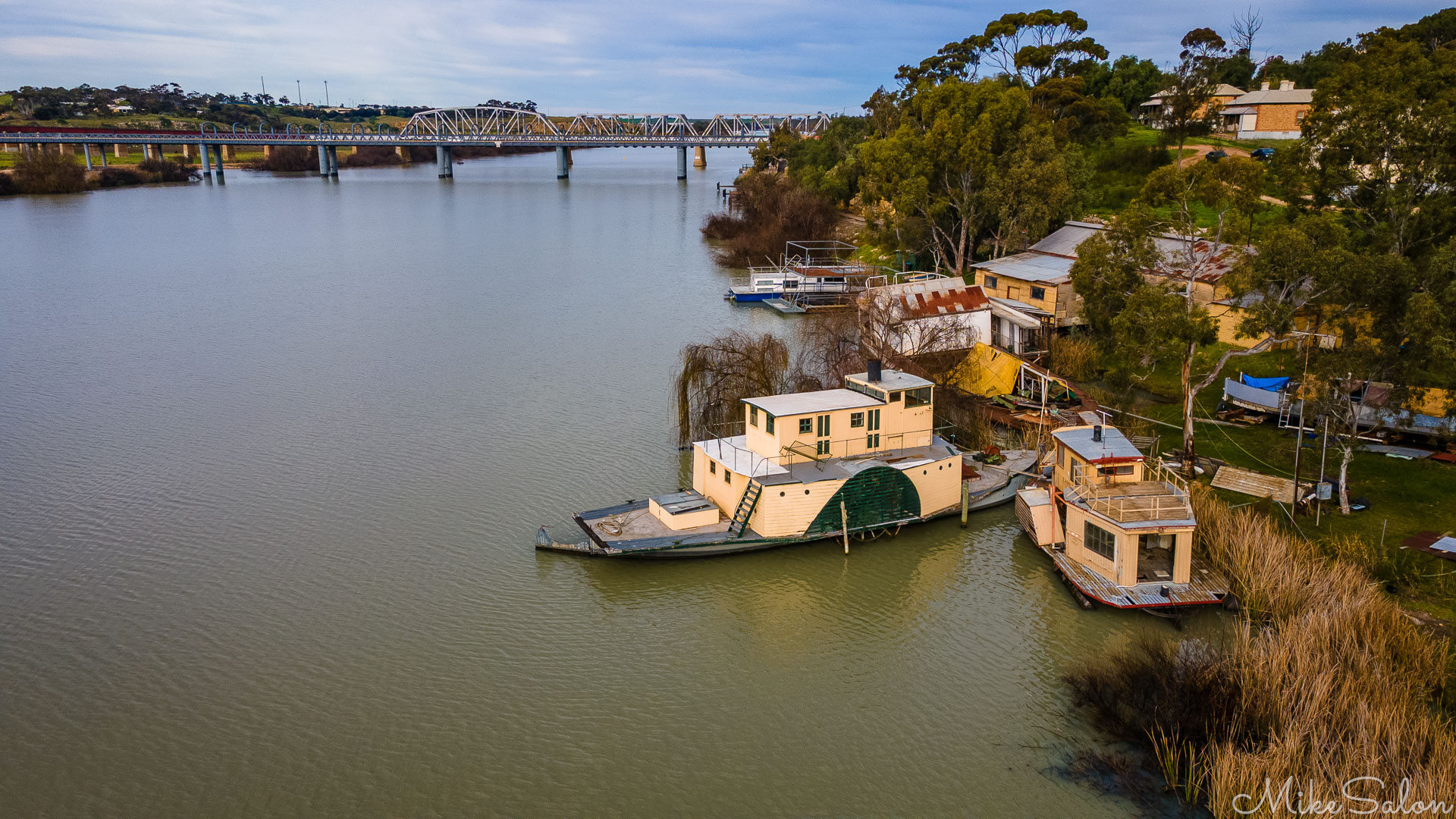 View of two abandoned side-wheeled paddle steamers at Murray Bridge. [0215]