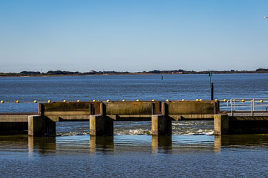 Three gates (out of dozens) in the barrage, so as to regulate the water levels upstream, and to keep a flow going downstream. [1570]