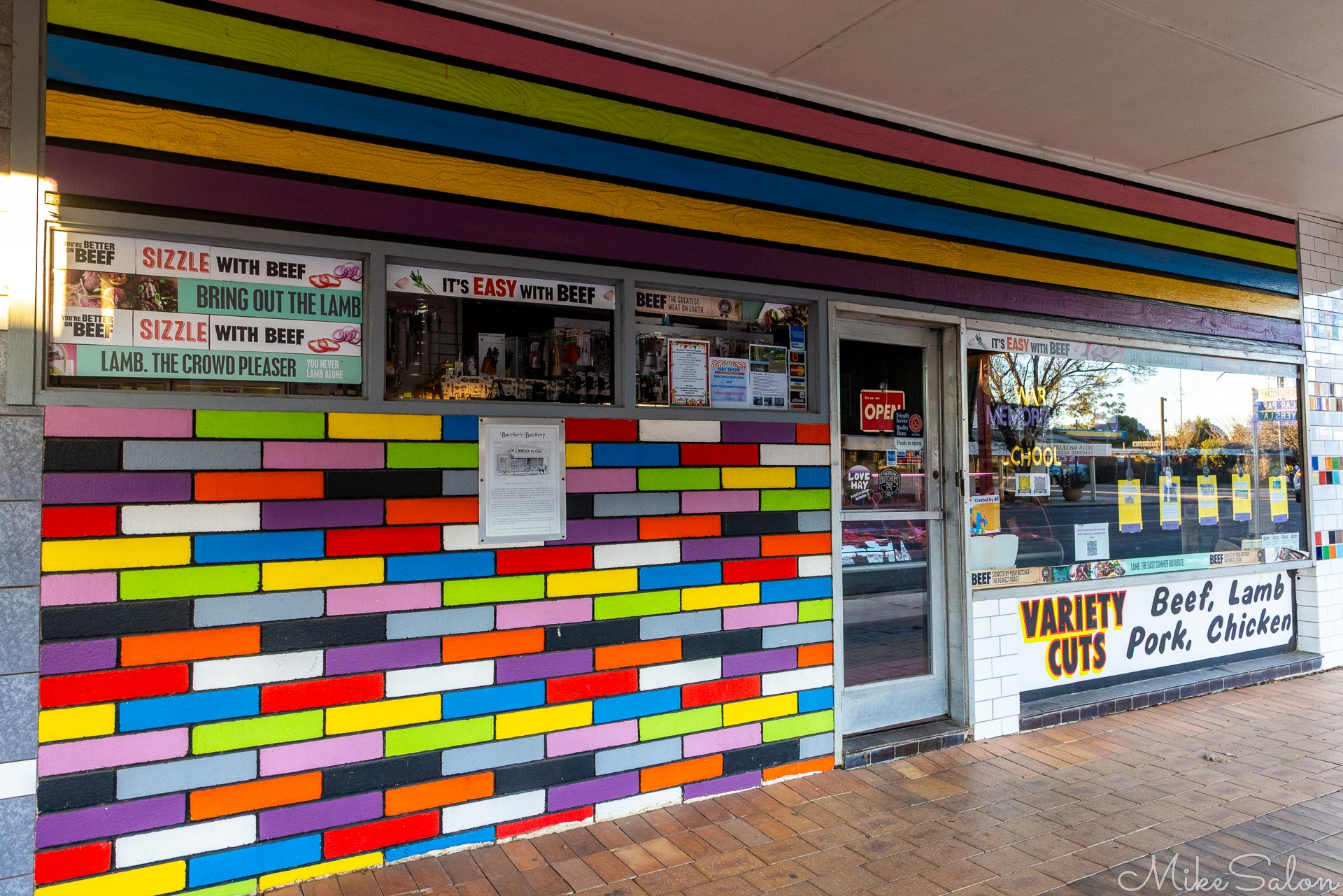 Butcher's Shop with a very colorful tiled facade. [5058]