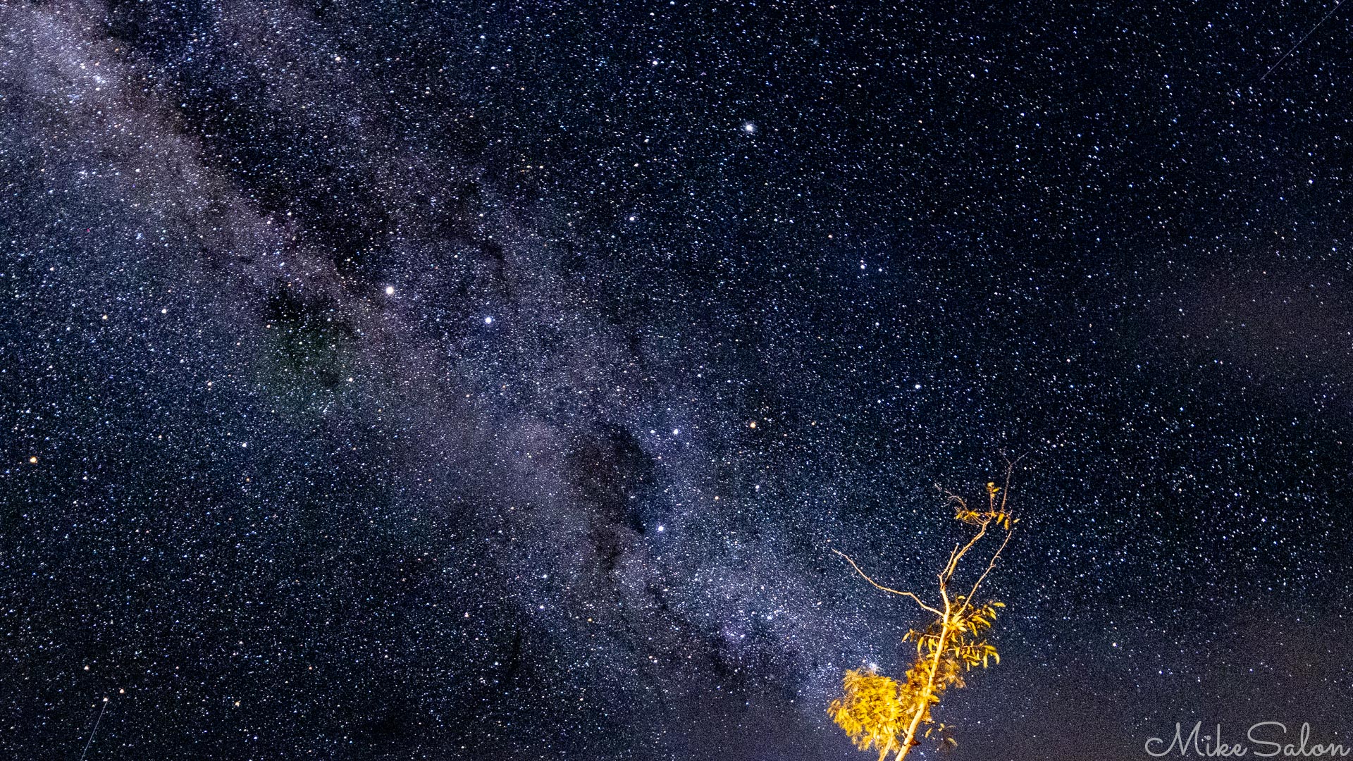 The night sky from Ivanhoe with Crux visible despite some clouds. [2003]