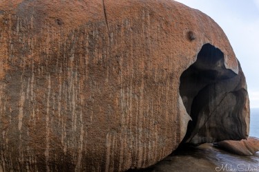 Rain in streaks wetting a Remarkable rock. [3501]