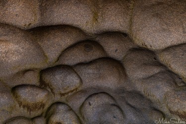 Lumpy ceiling inside a rock cave. [3486]