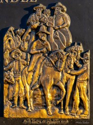 Bronze relief plaque depicting Burke and Wills with horses.
