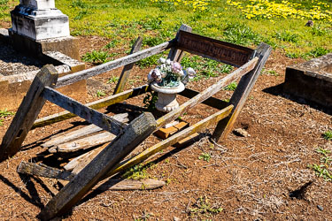 We didn't expect to find any relatives in the Merriwa Cemetery, but were moved by this sadly neglected child's grave, no headstone. [5446]