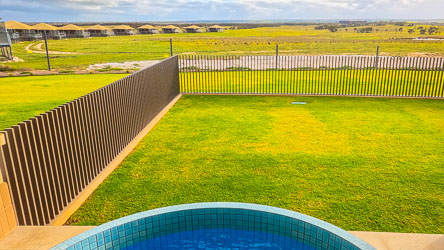 Looking out from the private plunge pool toward Monarto’s safari lodges, the air carried a crisp edge that made us wish for a few extra degrees in the hot tub — but the view more than compensated. [1492]