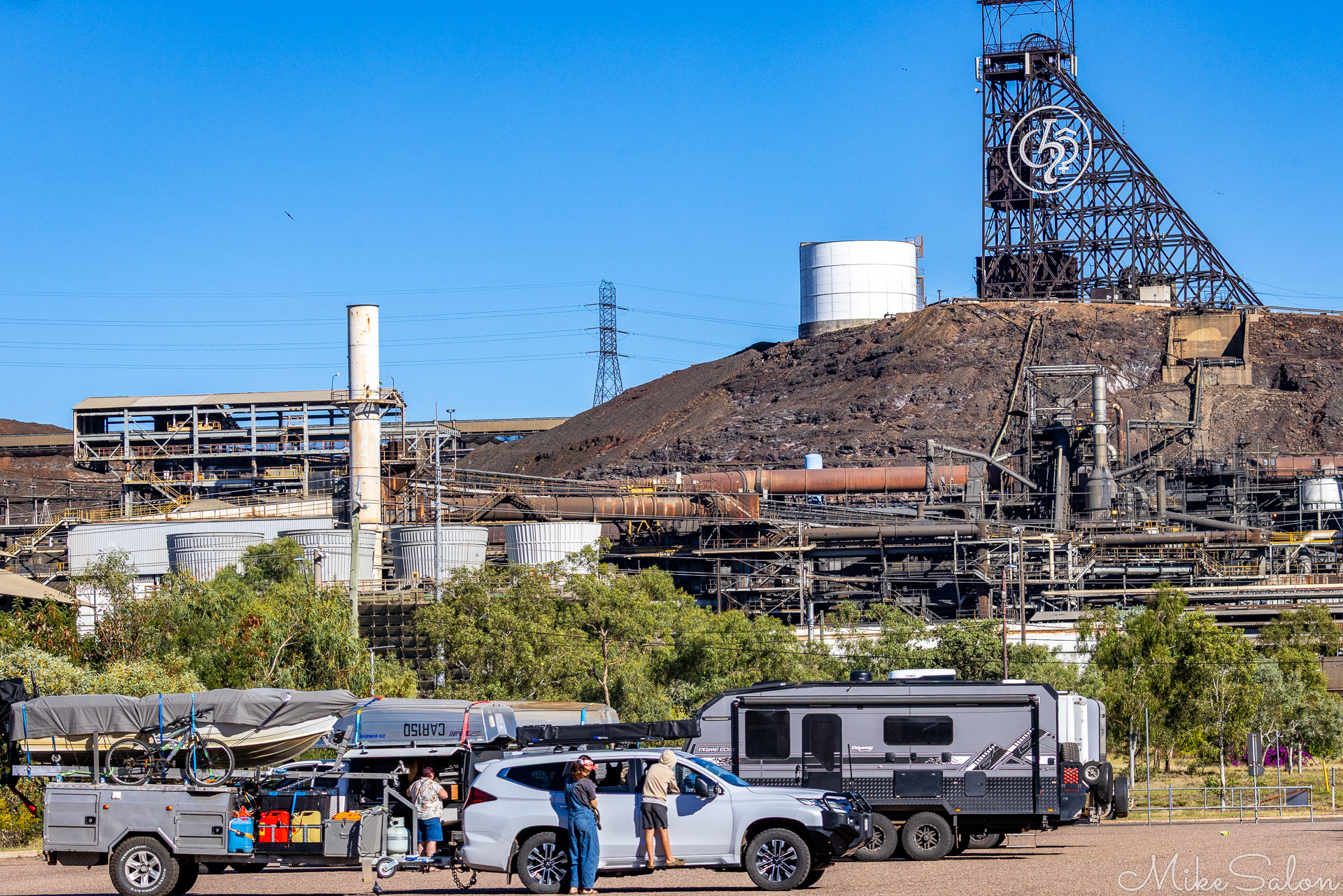Caravanners preparing their vans at the foot of the Mount Isa Mines. [6728]