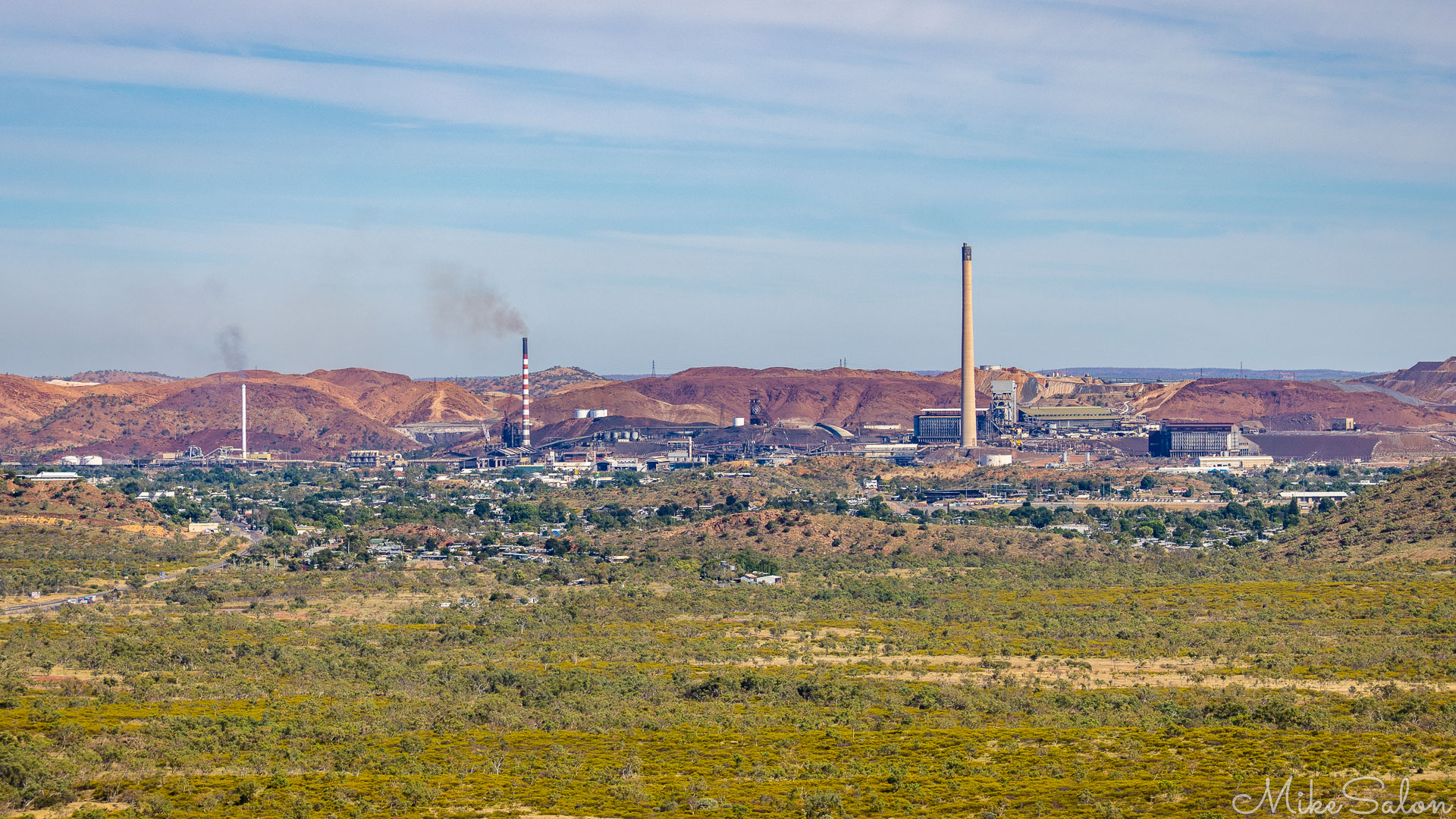 Iconiv view of Mt Isa, overlooked by the three smokestacks of the mines. [7134]
