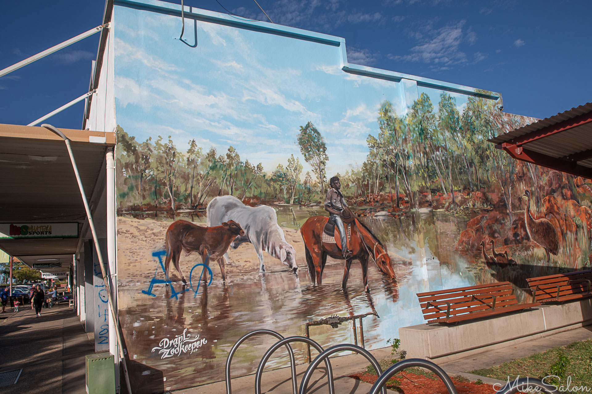 Mural on shop wall in Mt Isa of a classic Queensland rural scene. [0807]