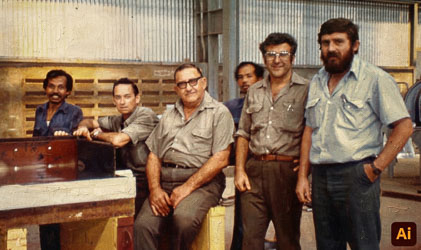 Aussie team members with local technicians in a steel plant.