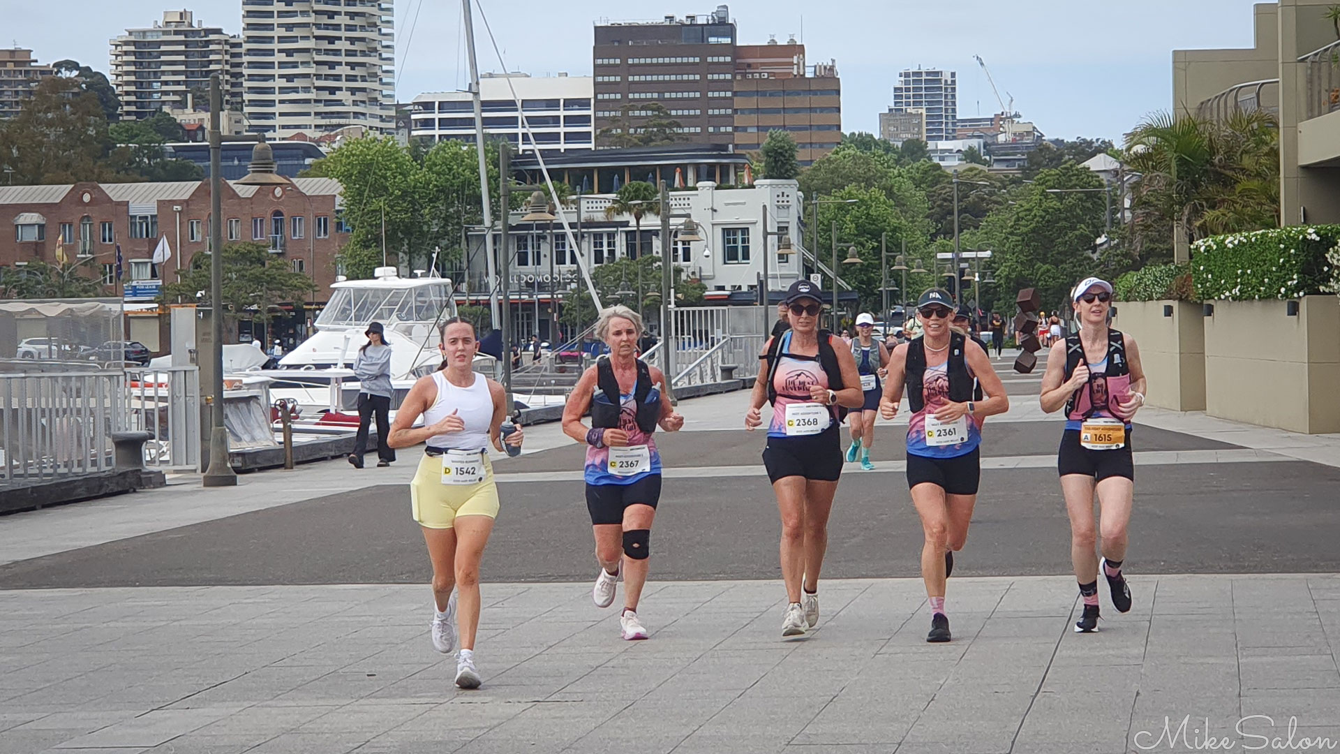 Presumably a friendship group, these 5 running side by side towards Mrs. Macquaries Point. [4751]