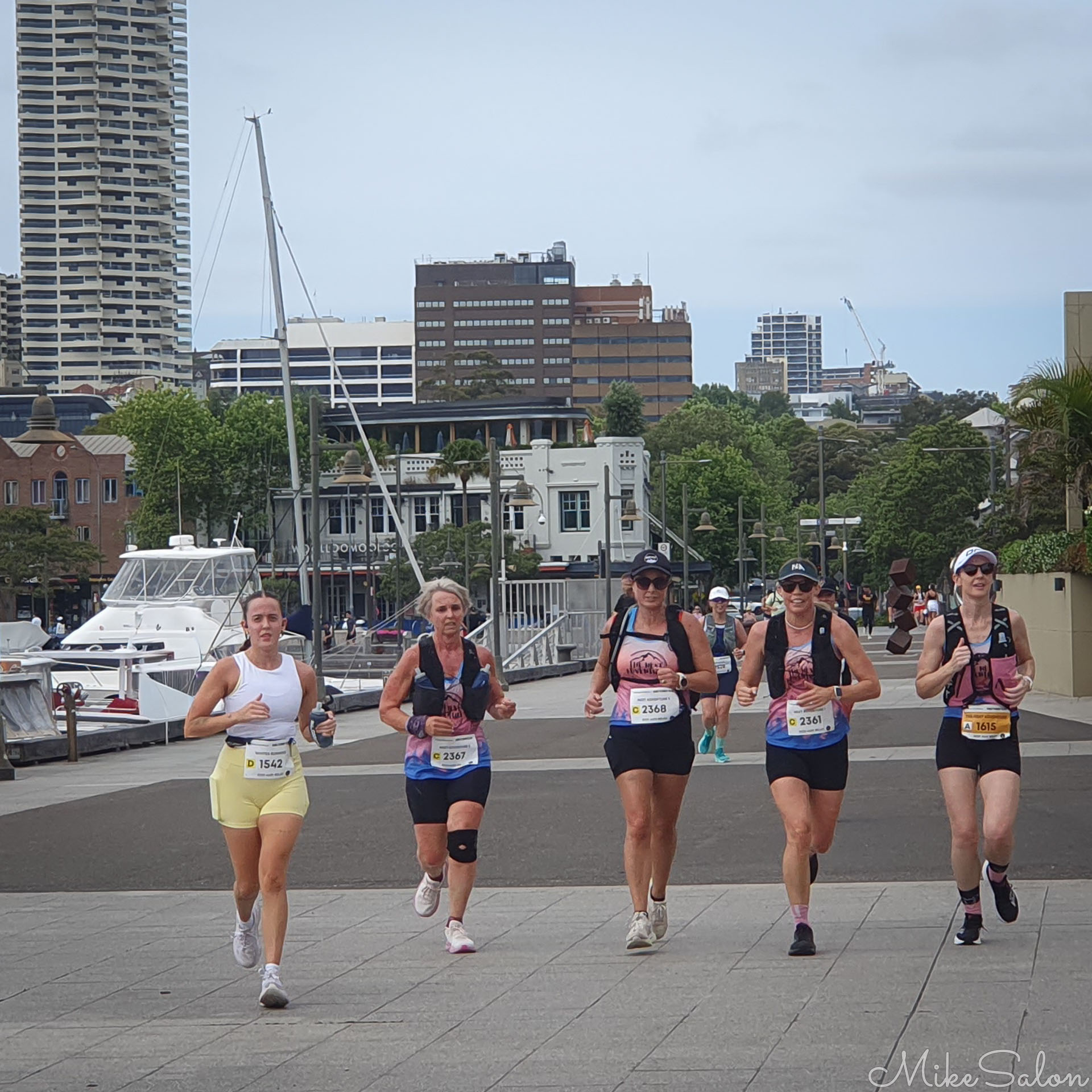 Presumably a friendship group, these 5 running side by side towards Mrs. Macquaries Point. [4751]