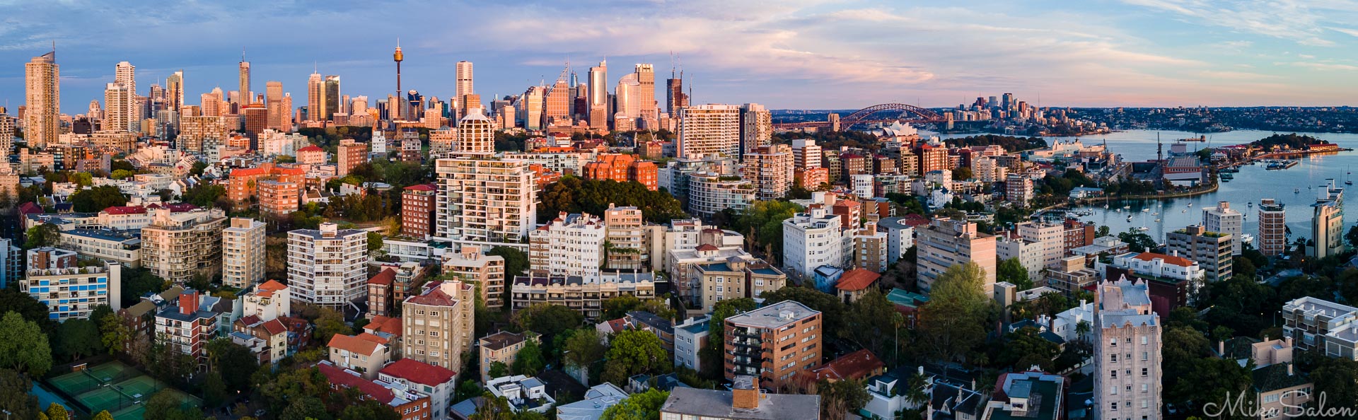 Dawn Light Over Sydney : The first morning rays shine onto Sydney's CBD as seen from the Eastern Suburbs. (DJI_0079-Pano.jpg)<br>Camera: FC3170