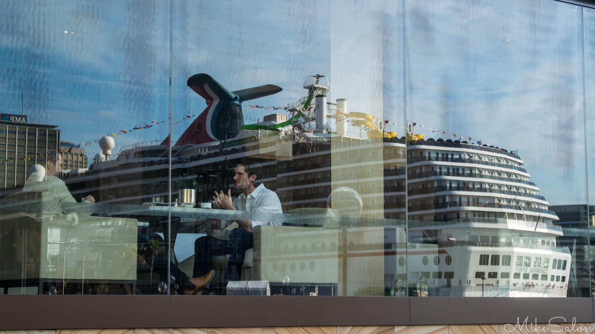 Reflections on Cruise Ships : Reflected in a glass cafe window, a cruise ship moored at the Overseas Passenger Terminal (DSC_2712.jpg)<br>Camera: NIKON 1 AW1