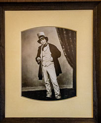 Framed black‑and‑white portrait of Henry Hopwood, founder of Echuca, wearing a top hat and formal 19th‑century attire.